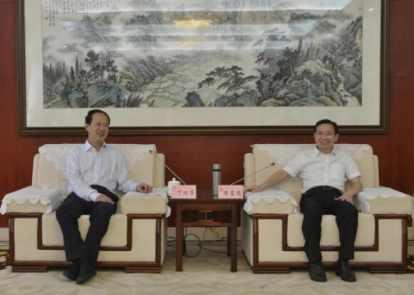 丁焰章拜會南昌市委副書記、市長黃喜忠